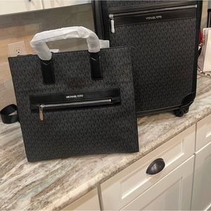 Michael Kors, black rolling bag with Crossbody bag for travel
